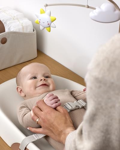 Contoured Wipe-Clean Baby Changing Pad with Toy Bar and Safety Belt