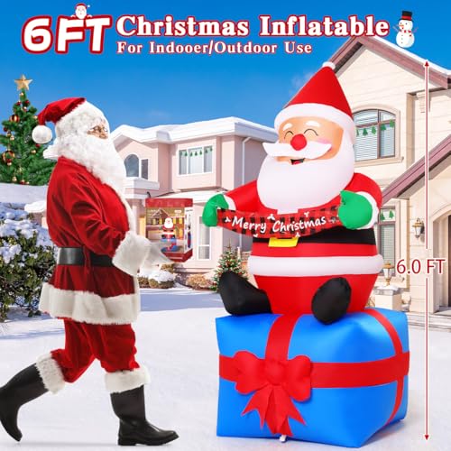 GOOSH 6 ft Christmas Santa Inflatable with LED Lights – Seated Santa on Gift Box with Banner