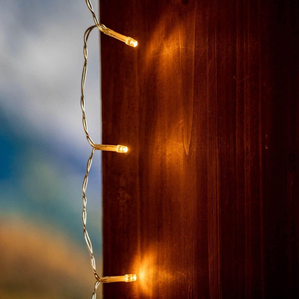 Novelty Lights LED Curtain Light Set - 300 Warm White LEDs | 8 Functions, Clear Wire Design