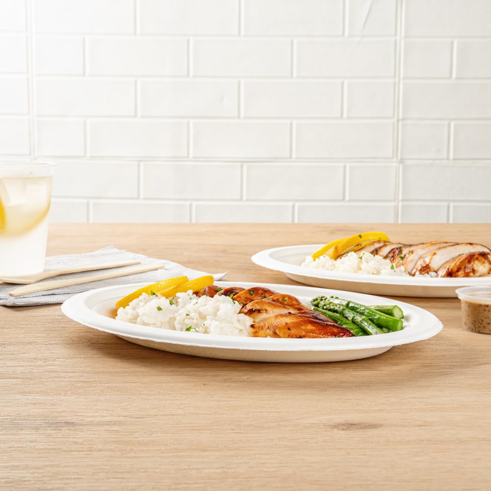 Restaurantware Pulp Safe No PFAS Added 10.4 x 7.8 Inch Medium Oval Plates 100 Disposable Plates - Home Compostable Microwavable And Freezable White Bagasse Plates For Hot And Cold Foods