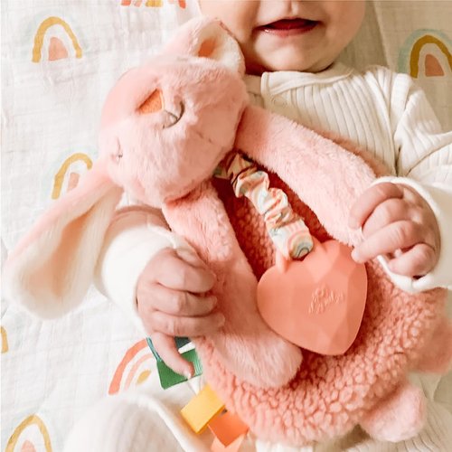 Itzy Ritzy - Itzy Lovey Baby Blanket with Teether - Soft Pink Bunny with Crinkle Sound & Textured Ribbons