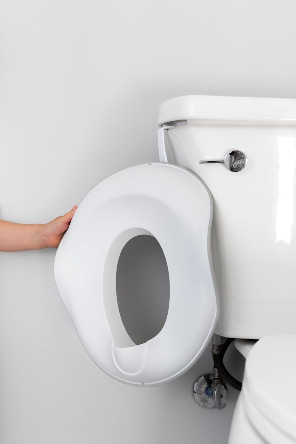 Ubbi Adjustable Toilet Trainer for Toddlers - Built-In Handles & Bonus Potty Hook - Gray