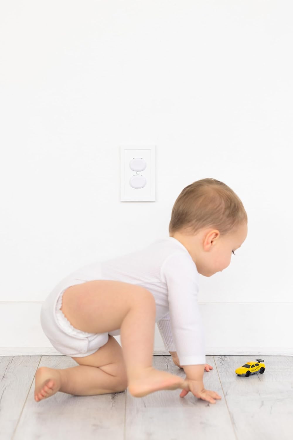 Ubbi Safety Bundle - Baby Proofing Set with 36 Outlet Covers, 16 Corner Protectors & 2 Pinch Guards | White