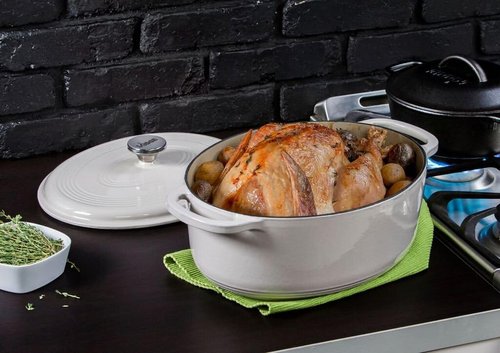 Lodge Enameled Cast Iron Dutch Oven - 7 Quart Oval with Lid & Dual Handles - Oven Safe to 500°F - Oyster White