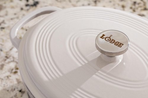 Lodge Enameled Cast Iron Dutch Oven - 7 Quart Oval with Lid & Dual Handles - Oven Safe to 500°F - Oyster White