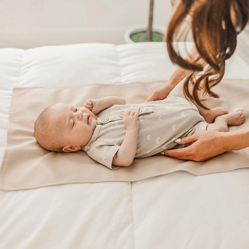Konssy Faux Leather Baby Changing Mat - Waterproof & Portable Diaper Pad for Travel | 30 x 17 Inches (Brown/Beige)
