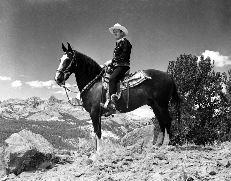 Gene Autry Riding a Horse in a Westerner Outfit Photo Print (30 x 24)