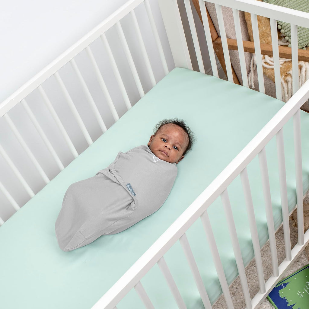 SwaddleMe by Ingenuity Baby Swaddle Blanket - 100% Cotton, 0-3 Months, Improves Sleep & Calms Reflex | Tropical Dino, 2-Pack