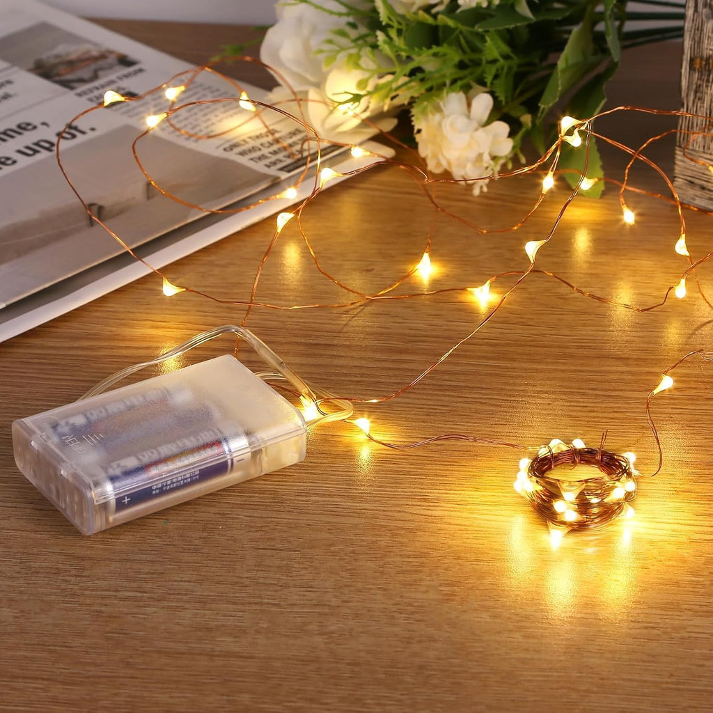 Sanniu LED String Lights - Mini Battery Powered Copper Wire Fairy Lights | 5m/16ft Warm White for Bedroom, Weddings, Parties