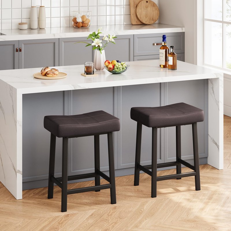 IDEALHOUSE 24 Inch Backless Saddle Barstools Set of 2, Counter Height Upholstered Padded Barstools with Curved Surface, Metal Leg and Footrest, for Kitchen Counter, Home Bar (Brown, 24 inch-Set of 2)