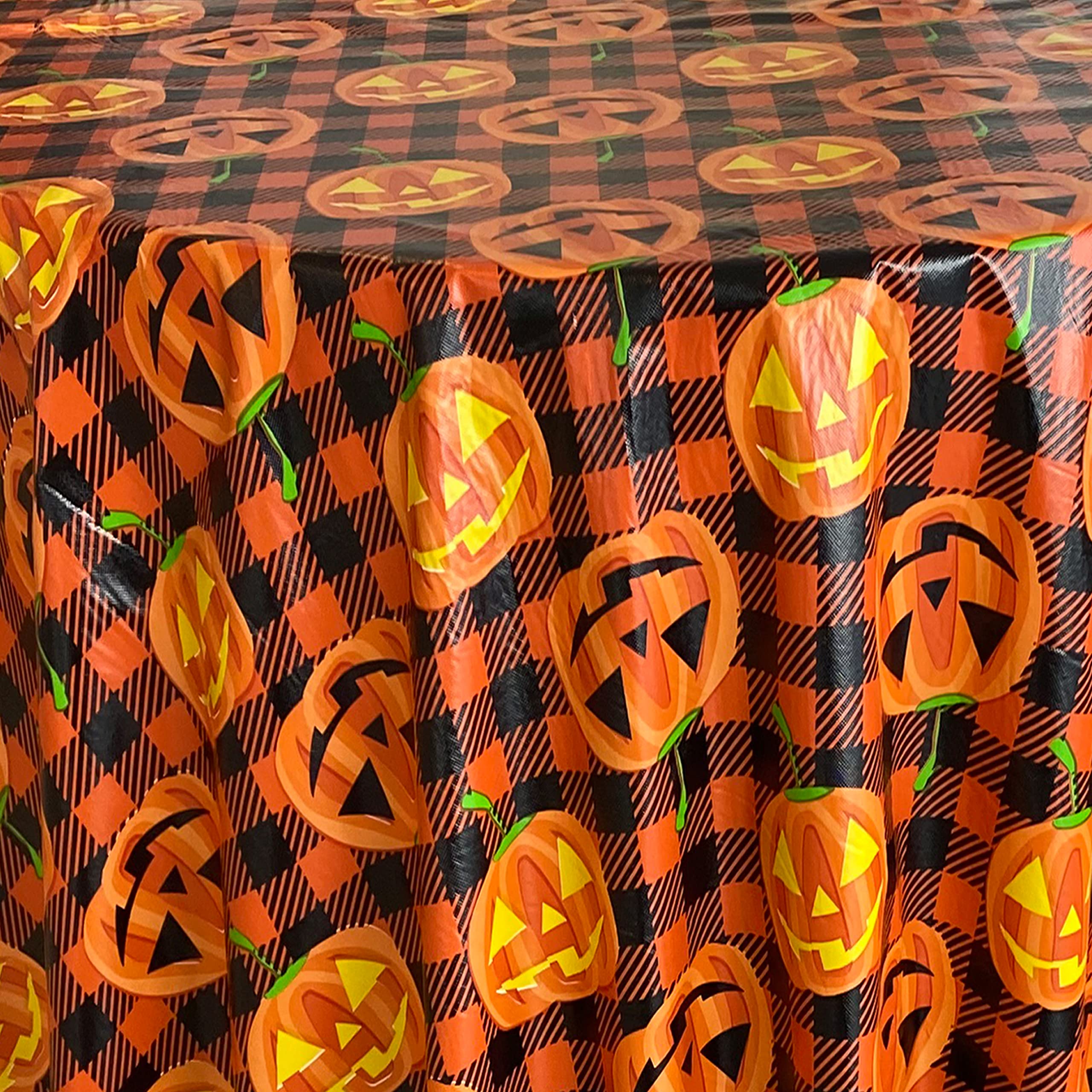 Newbridge Halloween Jack-O’-Lantern Vinyl Tablecloth with Flannel Backing, 70 Inch Round, Orange and Black Buffalo Plaid with Spooky Pumpkin Faces, Wipe Clean Halloween Table Cover