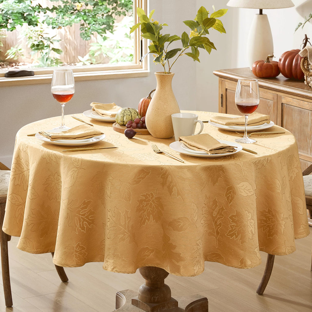 Newbridge Gold Fancy Leaves Damask Fabric Holiday Tablecloth, 70 Inch Round, Elegant Swirling Leaf Pattern, No Iron Soil Resistant Dining Room Party Table Cover