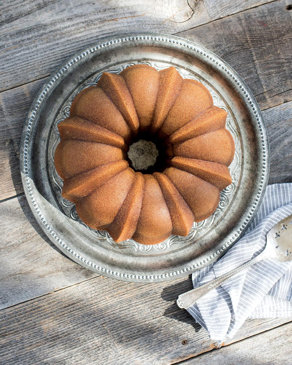 Nordic Ware 12-Cup Bundt Pan - Classic Toffee Finish for Perfectly Baked Cakes
