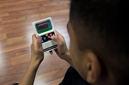 Basic Fun Classic | Retro Handheld Football Electronic Game - Perfect for All Ages
